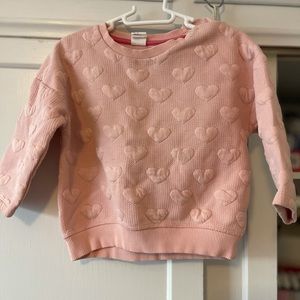 H&M pale pink sweater. Toddler 12-18 months. My daughter wore at 3 years old.
